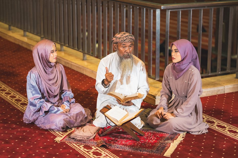 Foto sebuah mushaf Al-Quran yang terbuka di atas meja kayu perpustakaan klasik dengan latar belakang deretan kitab-kitab kuning (turats) dan cahaya lampu yang temaram memberikan kesan kedalaman ilmu.